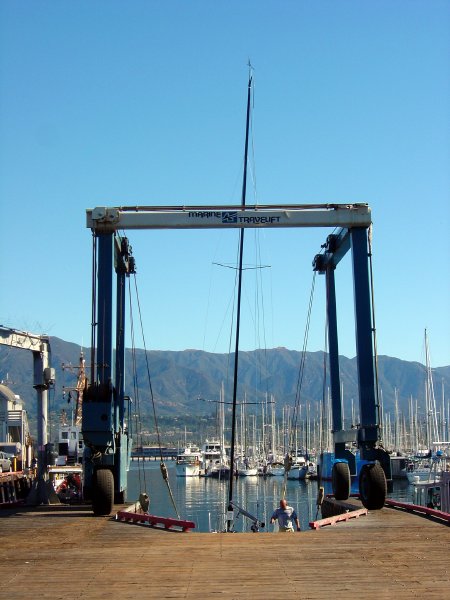 Travel lift helping boats out of the water